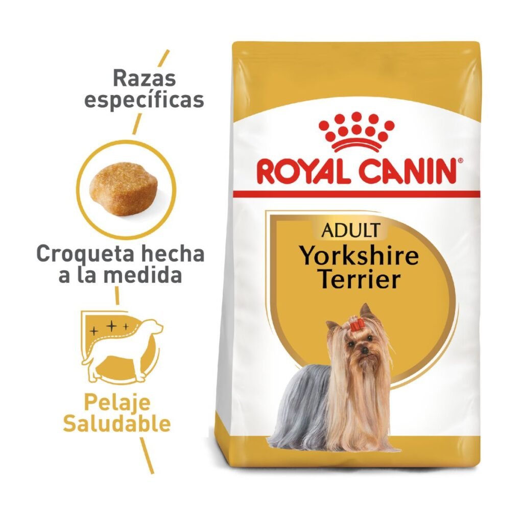 Empaque frontal del alimento para perro Royal Canin Yorkshire Terrier Adulto. El paquete presenta un fondo de color blanco, con imágenes de un perro de raza Yorkshire Terrier adulto saludable. En la parte superior, destaca el logotipo de Royal Canin, junto con la indicación 'Adult Yorkshire Terrier'